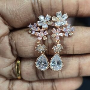 Beautiful rose goldtone layered ear cz earrings no returns